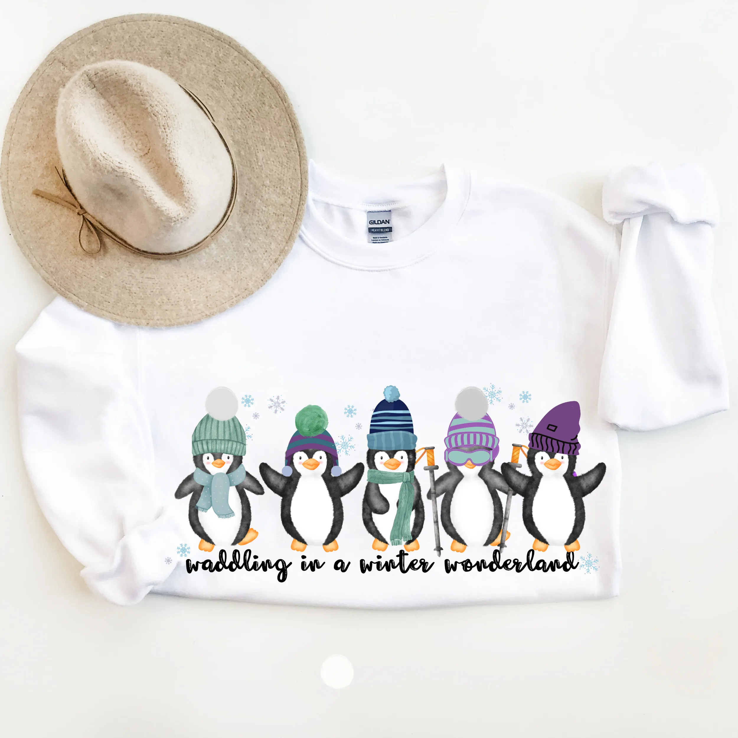 Waddling In A Winter Wonderland Women's Unisex Crewneck Sweatshirt Cute Winter Penguins in Hats and Scarves Funny Winter